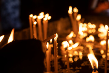 Wall Mural - light candles in the church