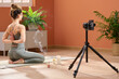 © Guille Faingold/Stocksy - Yoga teacher doing reverse namaste pose.