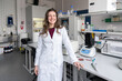 © Hernandez & Sorokina/Stocksy - Smiling Researcher In Lab
