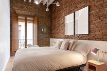 Stylish Bedroom Interior With Brick Walls