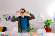 © ByLorena/Stocksy - Boy creating art with colorful paper spending time at home