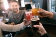 © Sean Locke/Stocksy - Brewery: Group Of Friends Celebrate By Raising A Glass