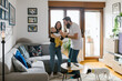 © Mihajlo Ckovric/Stocksy - Family lifestyle, young millennial parents spending free time with their baby