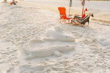 Handmade Sand Castles Of A Shark And Crocodile. 