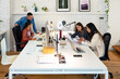 © Bisual Studio/Stocksy - Business people in workspace