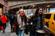 © Samantha Estrada/Stocksy - Happy couple in the snow at Grand Central Terminal