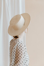 Girl In A Polka Dot Dress And Hat