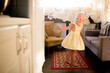 © Jennifer Bogle/Stocksy - Girl in sundress in camper