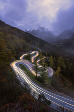 Long Winding Road In The Alps Of Switzerland