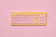 © Yaroslav Danylchenko/Stocksy - Craft computer keyboard from colorful paper.