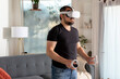 © Jayme Burrows/Stocksy - Man Plays VR Game