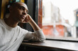© Mattia/Stocksy - Young Man Using Computer Seated in a Coffee Shop