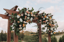 Beautiful, Floral Arch At Wedding Ceremony Site