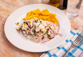 Wall Mural - Ceviche of trout served with onion, parsley and boiled corn