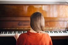 Woman And Piano