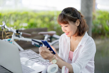 Wall Mural - Asian woman work in park