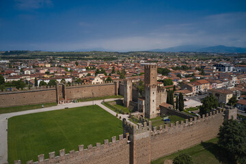 Aerial view of the Italian historic castle Castello Scaligero, view of the Villafranca di Verona. Historical part of the city Villafranca di Verona, Verona, Italy.