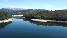 Beautiful Drone Flight Over A Dam In Portugal, On A Clear Sunny Day