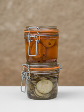 Pile Of Glass Jars With Preserved Homemade Pickles