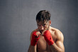 © Nicklaus Walter/Stocksy - Portrait Of Exhausted Kickboxer Training