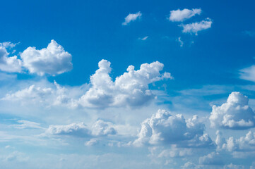 Wall Mural - blue sky background with tiny clouds. panorama white fluffy clouds in the blue sky.beautiful vast bl