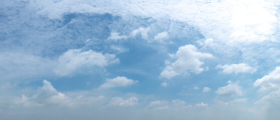 Wall Mural - blue sky background with tiny clouds. panorama white fluffy clouds in the blue sky.beautiful vast bl