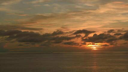 Wall Mural - Beautiful sunset on the sea with boat on the horizon.