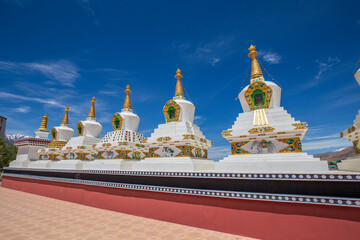 Wall Mural - White buddhist stupa or pagoda in tibetan monastery near village Leh in ladakh, noth India