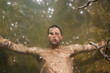 © Maryanne Gobble/Stocksy - Man Submerged Under water