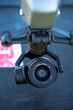 © Mike - Close Up of Camera Lens Attached to Gimbal Arm of UAV Drone