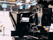 © David Prado/Stocksy - Professional video camera in TV studio