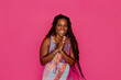 © Erin Brant/Stocksy - Joyous Black woman with long twisted hair