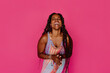 © Erin Brant/Stocksy - Laughing Black woman with long twisted hair