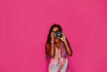 Black Female Photographer With Long Hair 