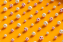 Soccer Balls On Orange Background