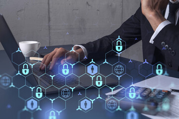 a programmer is typing a code on computer to protect a cyber security from hacker attacks and save c