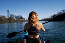 American Girl Kayaking At The River In Austin