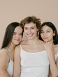 © Roman Shalenkin/Stocksy - Diverse smiling young women in studio