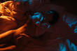 © Sergey Filimonov/Stocksy - Sensual woman touching her body on bed