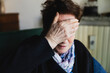 © Michela Ravasio/Stocksy - Elderly woman with hand on face