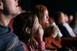 © Sean Locke/Stocksy - Movies: Father With Girl During Scary Movie