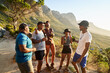 © Juno/Stocksy - Outdoor lifestyle friends having drinks