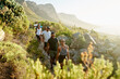 © Juno/Stocksy - Friends walking in nature