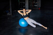 © Branko Starcevic/Stocksy - Female practicing on pilates ball.