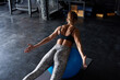 © Branko Starcevic/Stocksy - Female practicing on pilates ball.