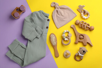 Wall Mural - Flat lay composition with baby clothes and accessories on color background