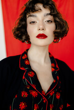 Portrait Of Brunette Woman With Red Lips