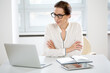 © chagin - Portrait of a business woman at workplace in office