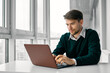 © SHOTPRIME STUDIO - business man at his desk in front of laptop working internet technology
