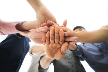 group of people holding hands